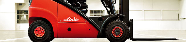 Images shows close-up view of a Linde MH forklift truck and a Tennant cleaning machine